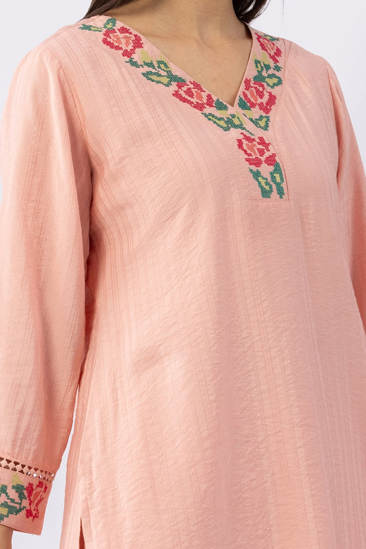 Peach co-ord set for women with embroidered V neck top and pants