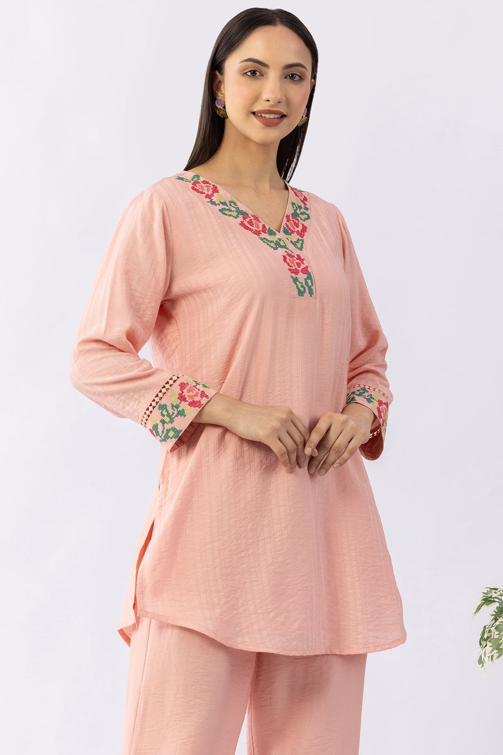 Peach co-ord set for women with embroidered V neck top and pants