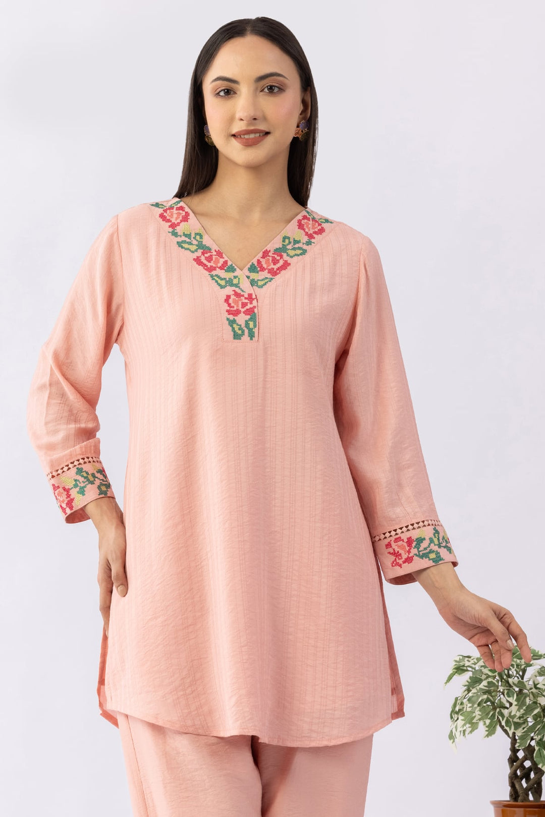 Peach co-ord set for women with embroidered V neck top and pants