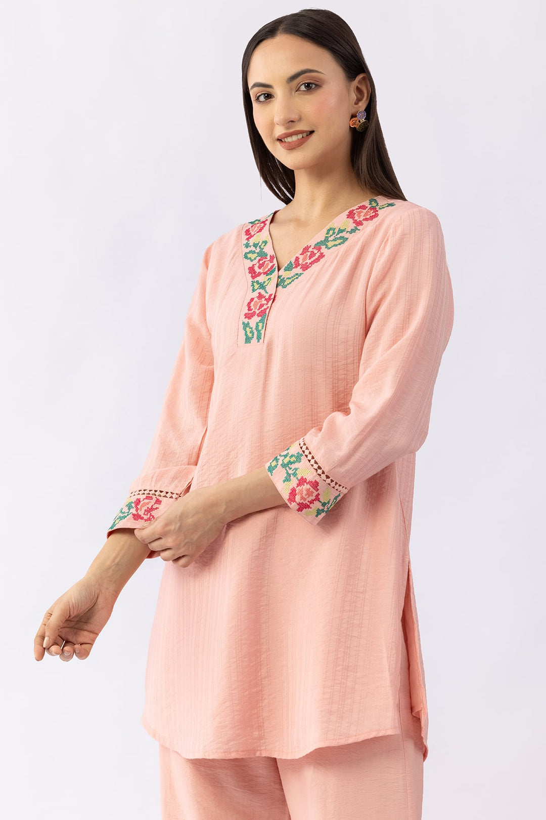 Peach co-ord set for women with embroidered V neck top and pants