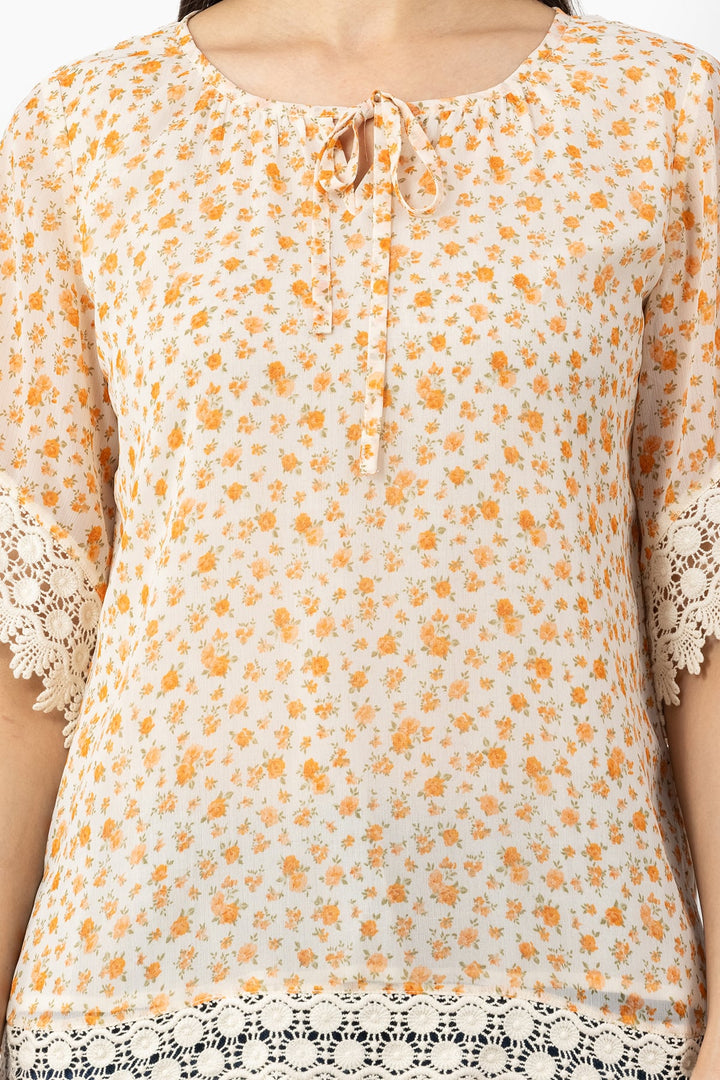 Orange Printed Chiffon Half Sleeve Top with Round Neck