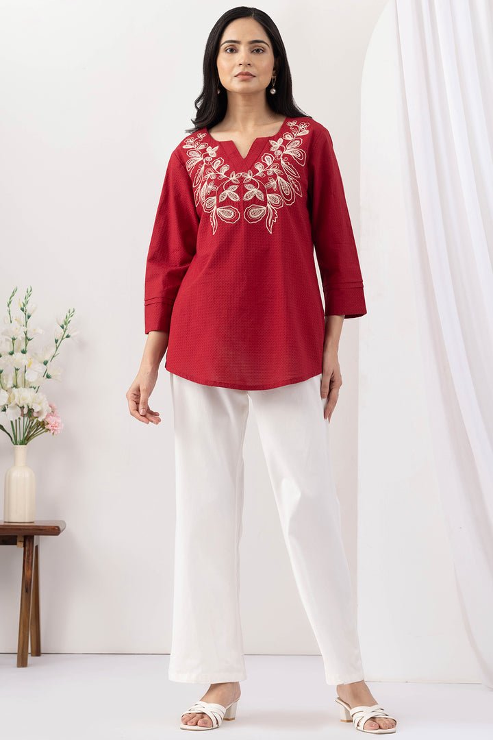 Red top for women with embroidered detailing