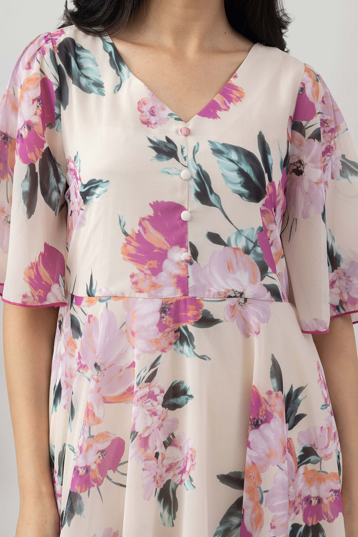 Light Pink Printed Georgette Dress with V Neck &amp; Flared Sleeves