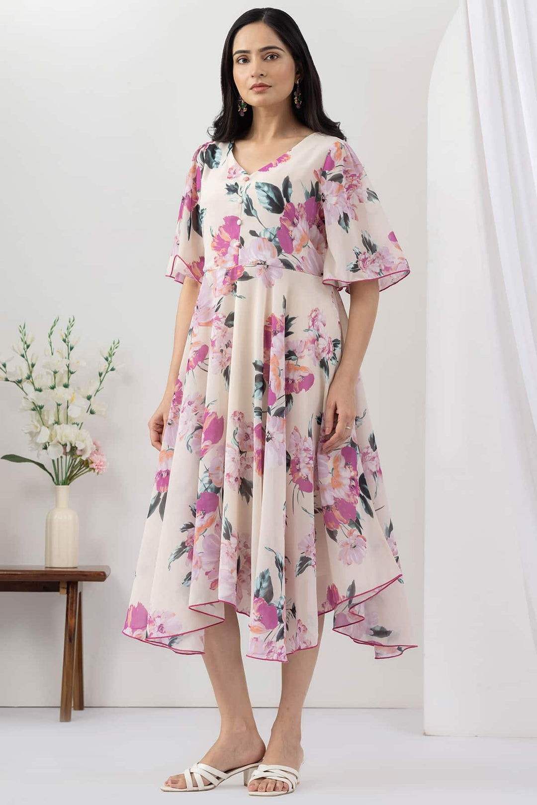 Light Pink Printed Georgette Dress with V Neck &amp; Flared Sleeves