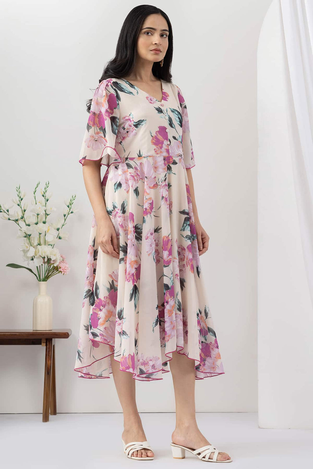 Light Pink Printed Georgette Dress with V Neck &amp; Flared Sleeves