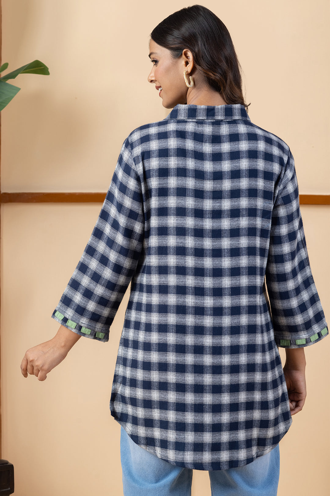 Navy winter tunic for women with checked pattern, collared neckline and 3/4th sleeves