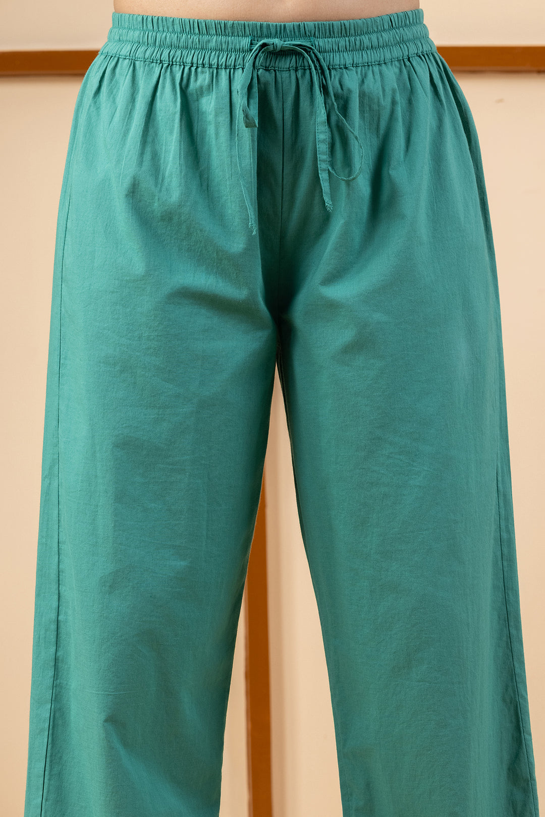 Green cotton fabric detail of women&
